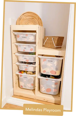 Wooden storage unit with clear plastic drawers for organizing toys or supplies.